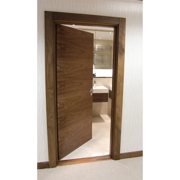 Horizontal Grain Walnut Veneer with Solid Walnut Frames and Architrave at Quay West, Isle of Man